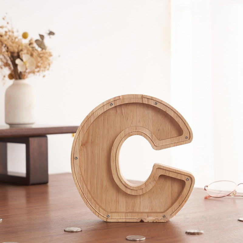 💛 Wooden Letter Piggy Bank – A Special Place for Their First Savings