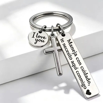 Maneja Con Cuidado Te Necesito Aquí Conmigo Keychain with Cross & 'I Love You' Charm