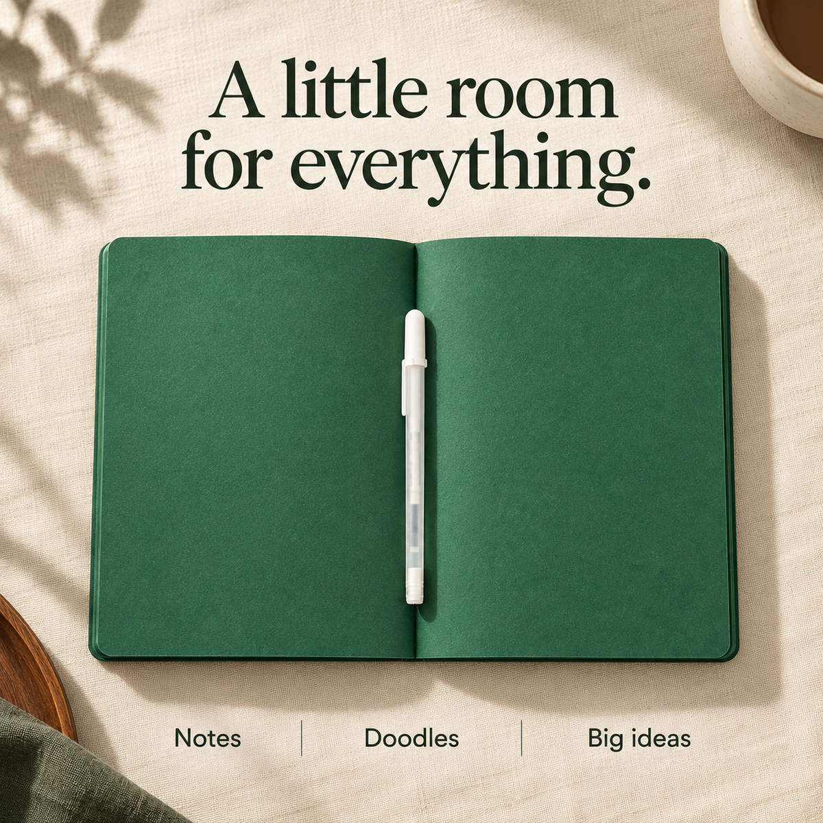 Unruled green notebook spread